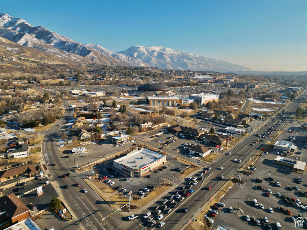 Birds eye view of property with a mountain view