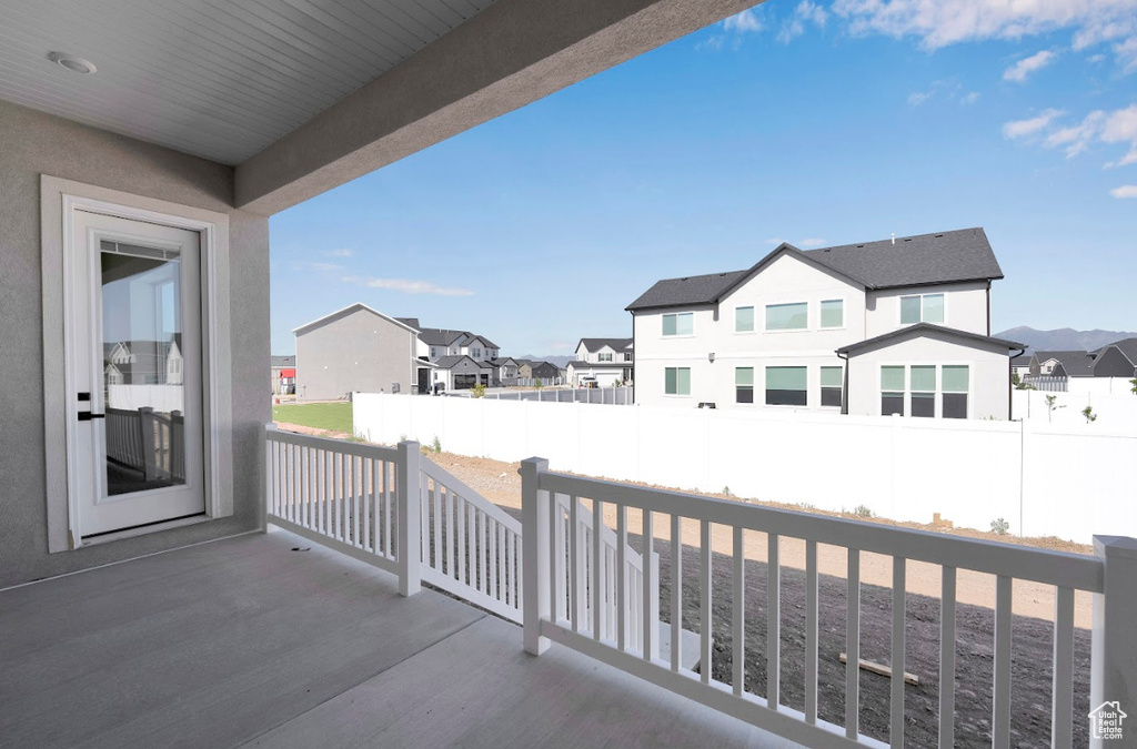 Fenced backyard featuring a residential view