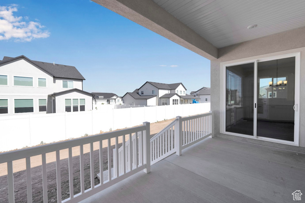 Fenced backyard featuring a residential view