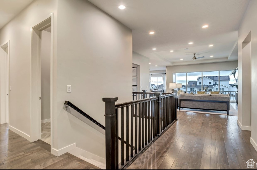 Stairway with hardwood / wood-style floors