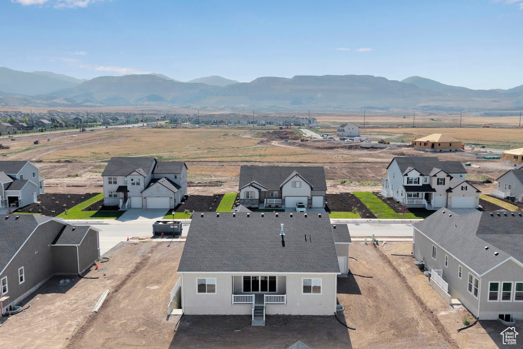 Aerial perspective of suburban area featuring mountains