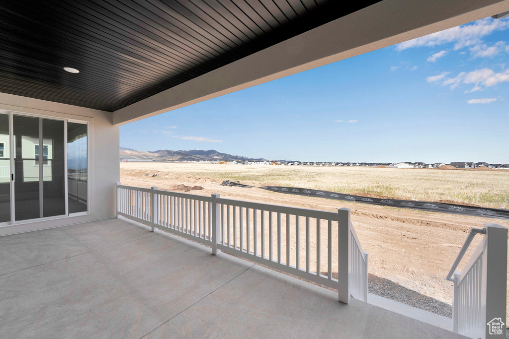View of patio with a mountain view