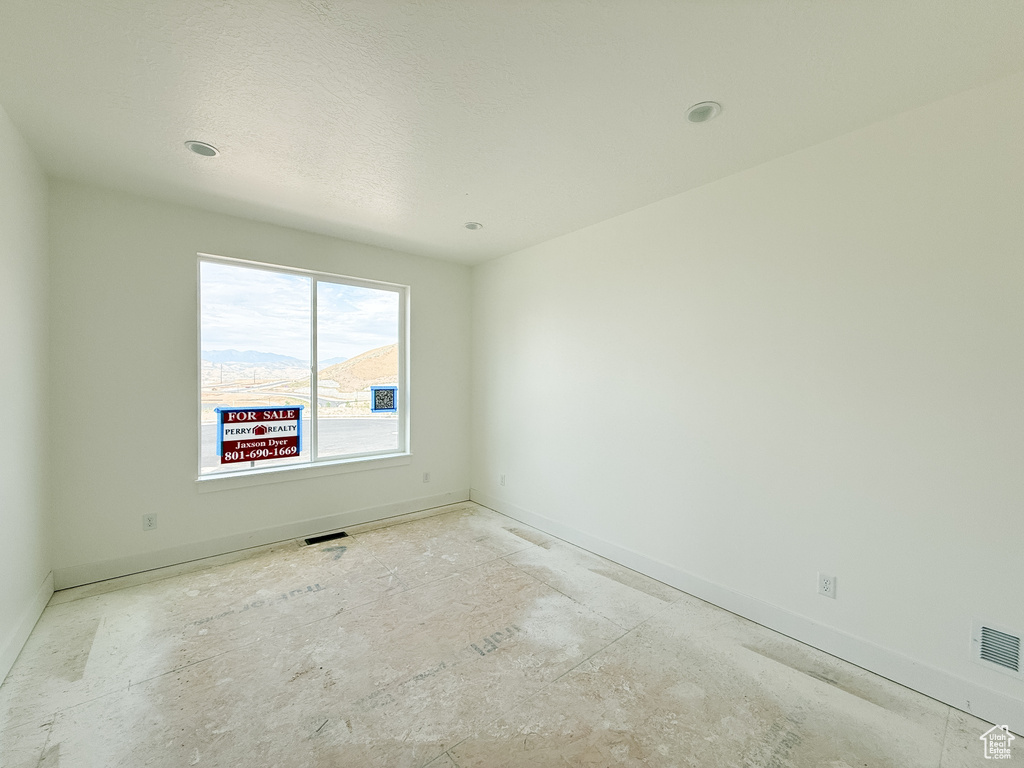 Empty room with baseboards