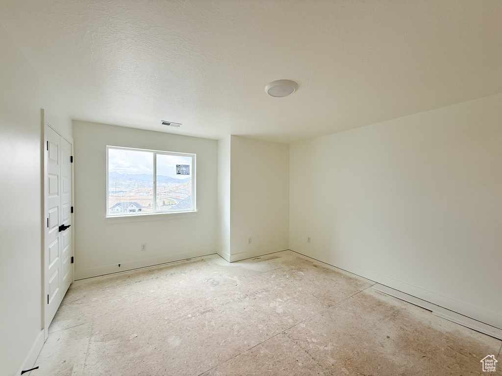 Spare room with baseboards
