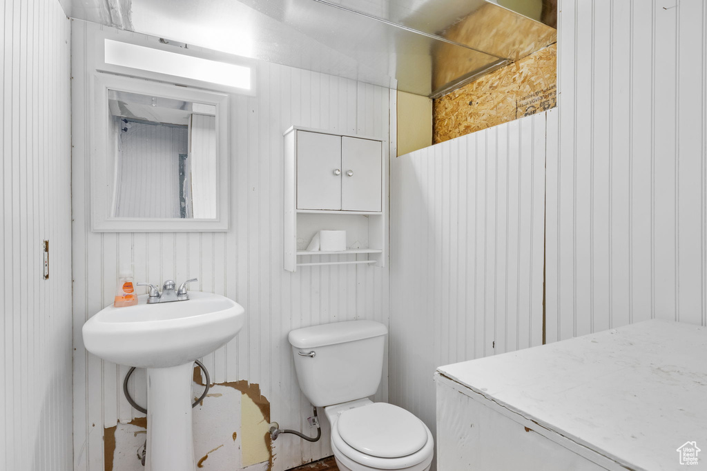 Bathroom with sink and toilet