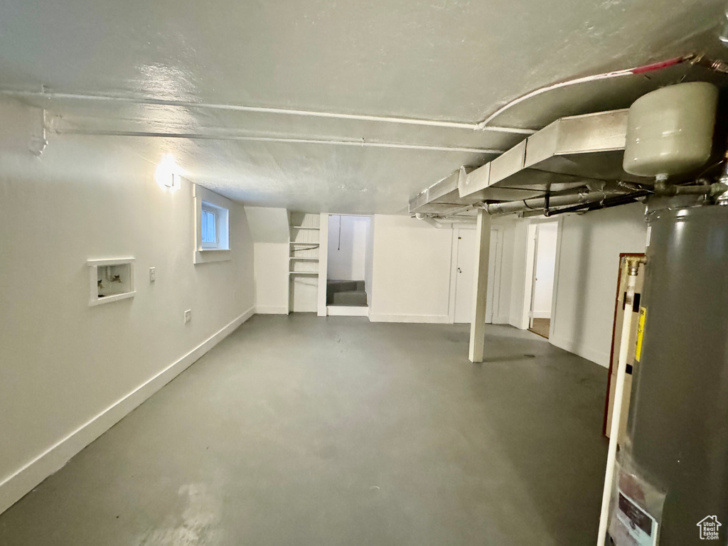 Basement featuring gas water heater