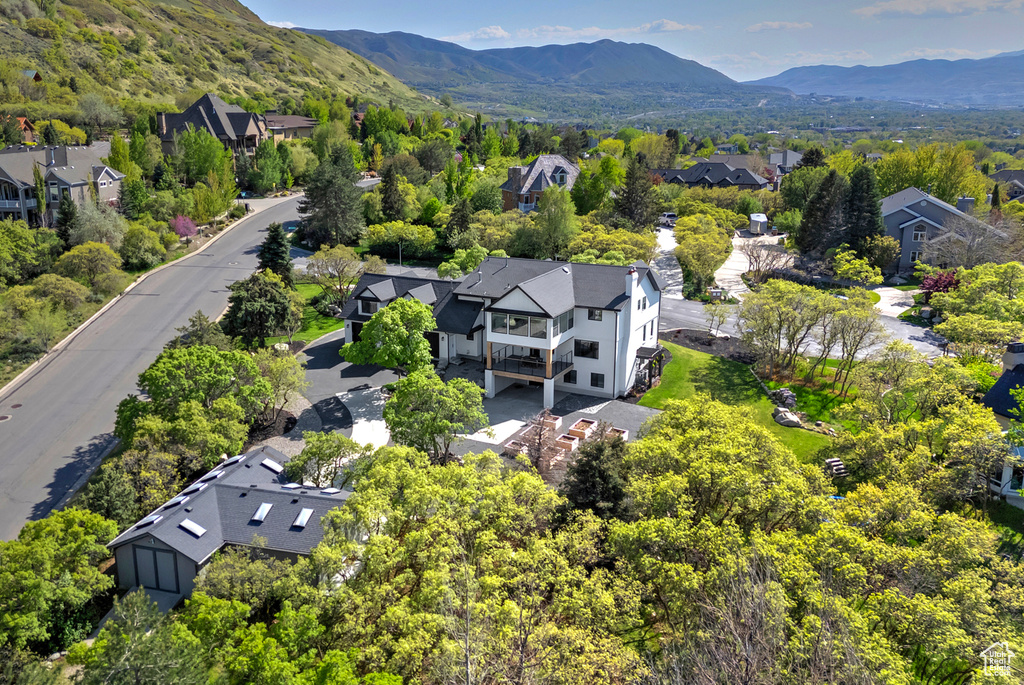 Birds eye view of property featuring a residential view and a mountain view