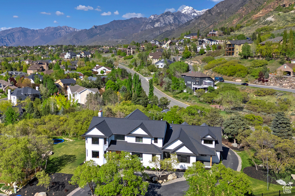 Birds eye view of property featuring a residential view and a mountain view