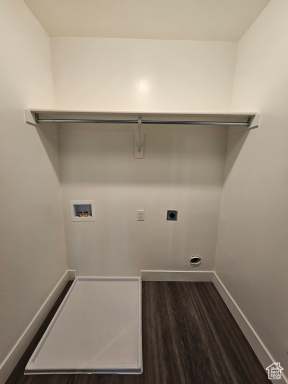 Washroom featuring hookup for a washing machine, electric dryer hookup, and dark hardwood / wood-style flooring