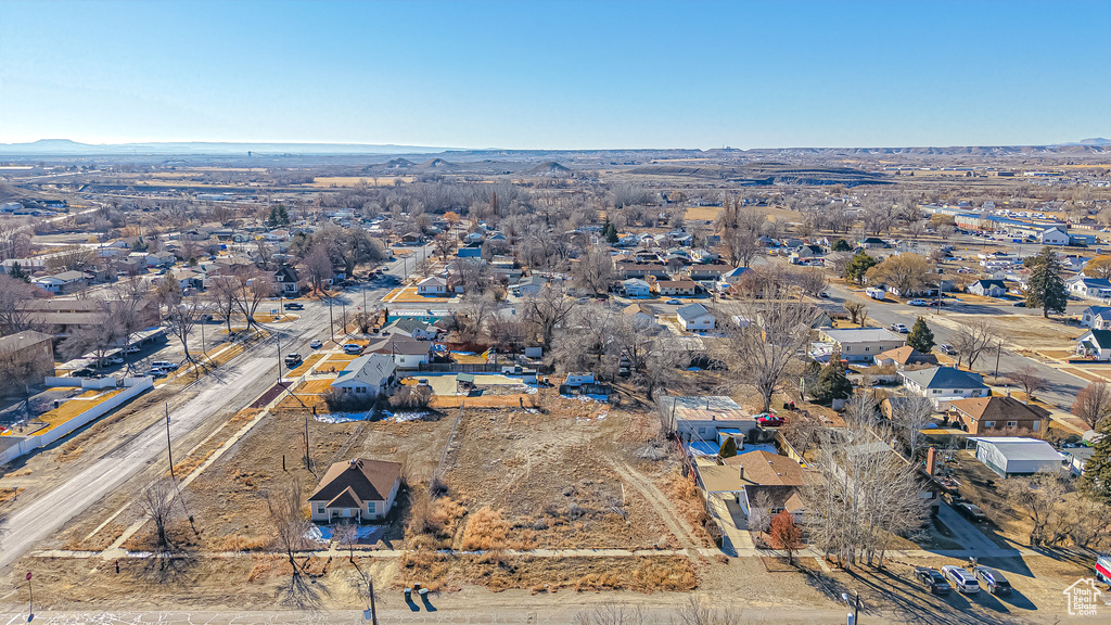 Birds eye view of property with a mountain view