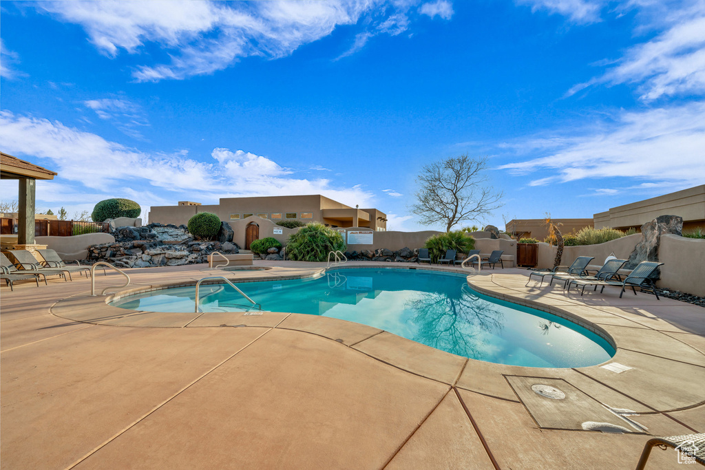 View of swimming pool with a patio