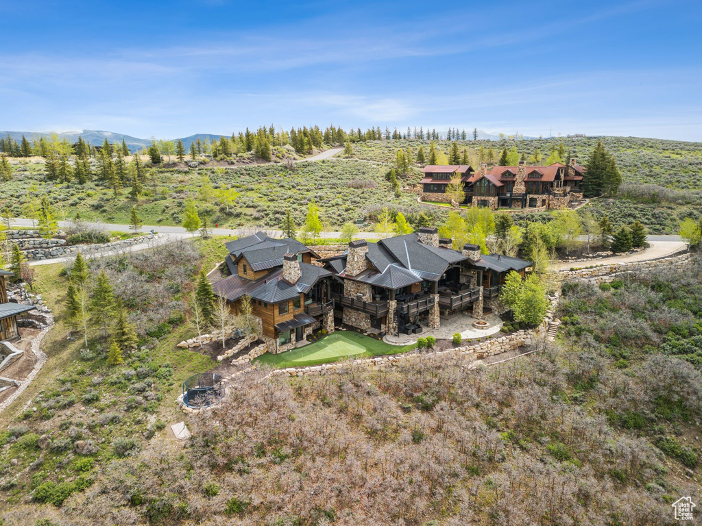 View of subject property with mountains