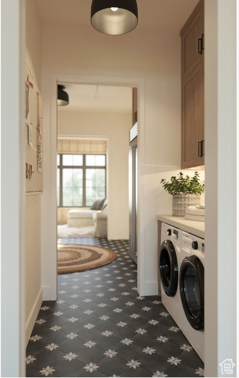 Laundry area with cabinets and washer and dryer