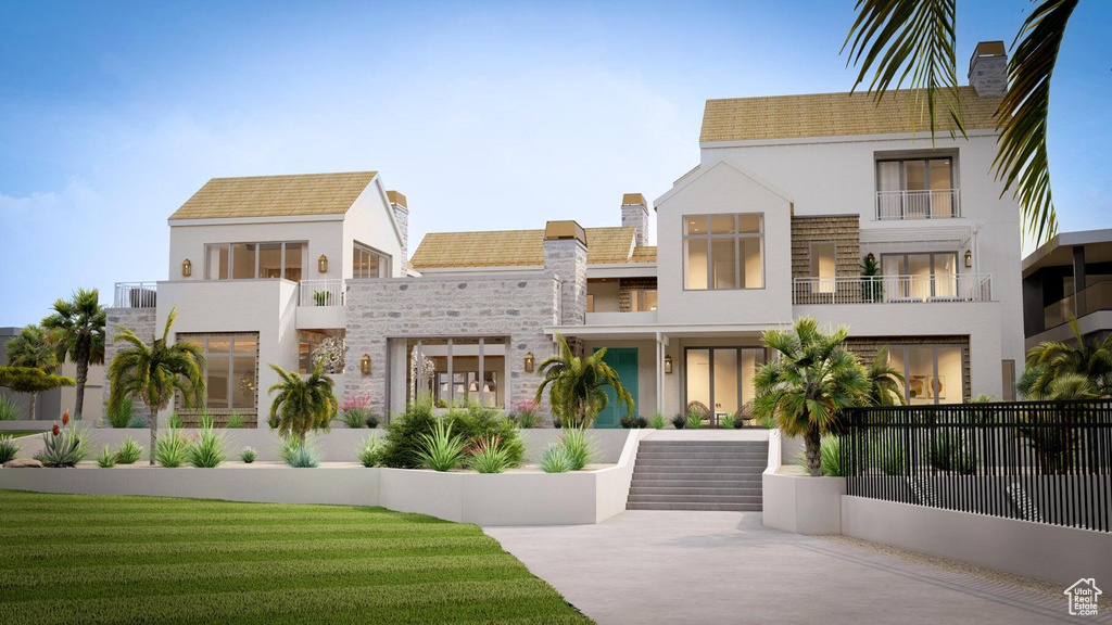 View of front of property featuring a front yard