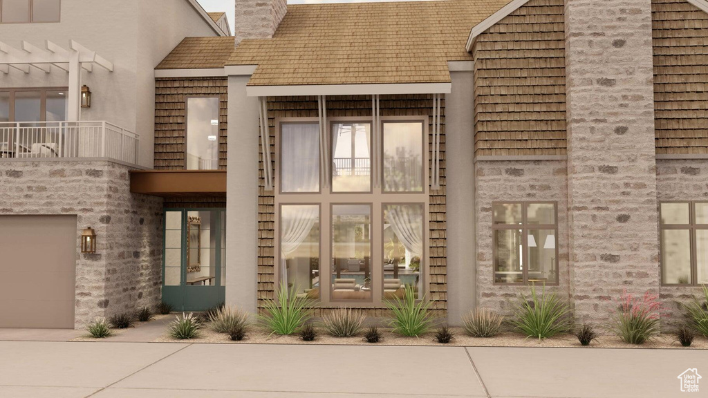 Doorway to property featuring a pergola