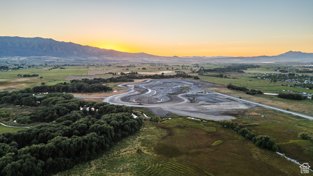 Aerial view at dusk with a rural view and a mountain view