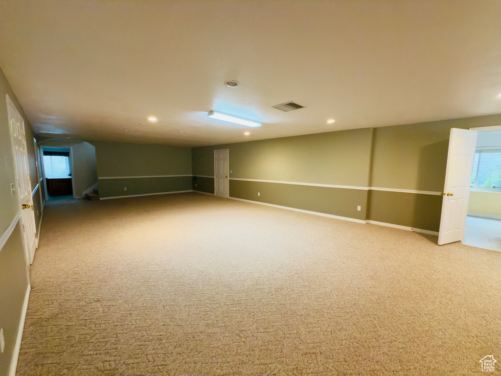 Basement with carpet and recessed lighting