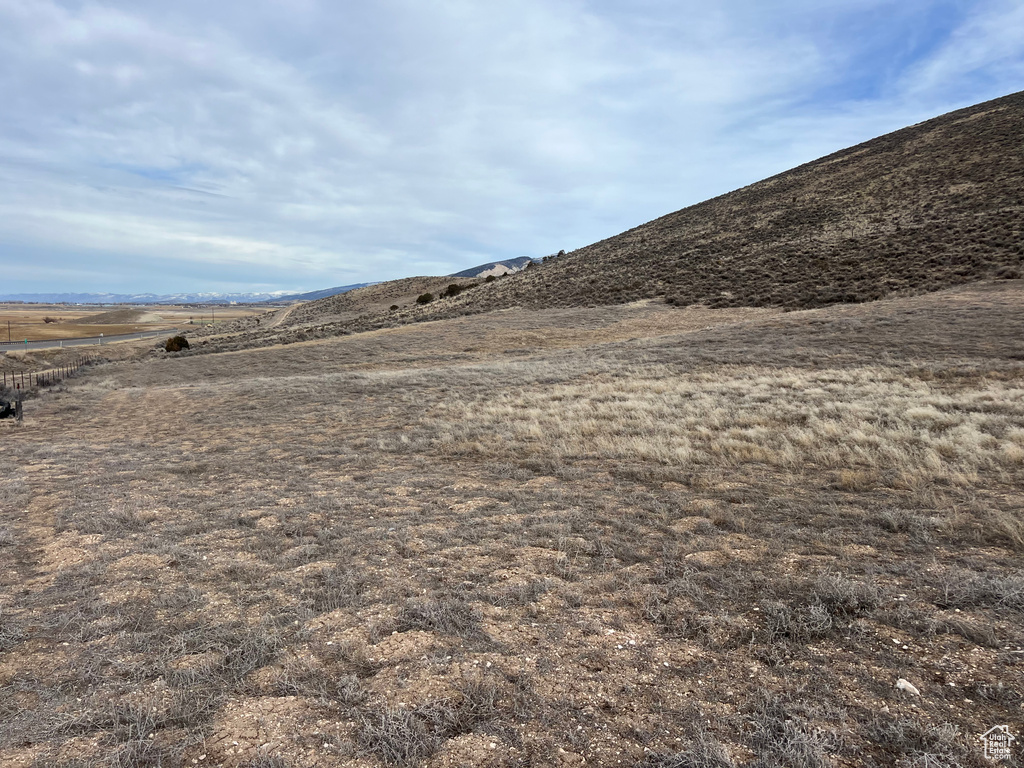 Property view of mountains featuring a rural view