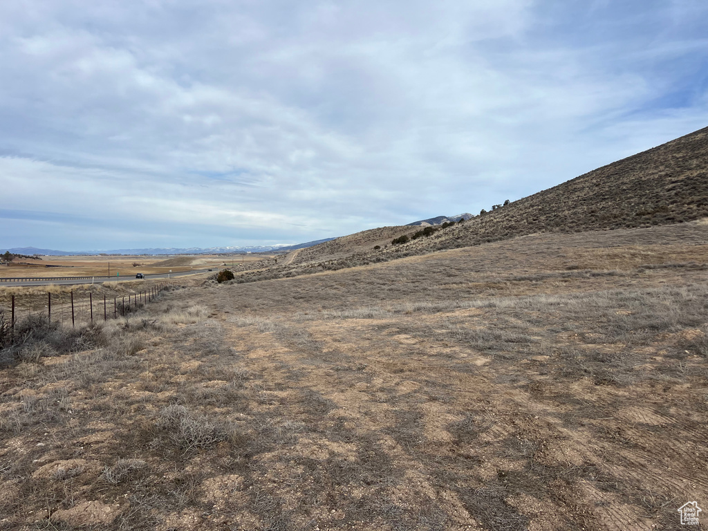 Property view of mountains featuring a rural view