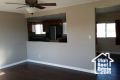 Unfurnished living room with ceiling fan