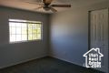 Empty room featuring ceiling fan