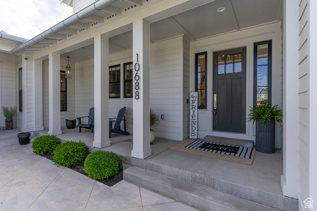 Property entrance with a porch