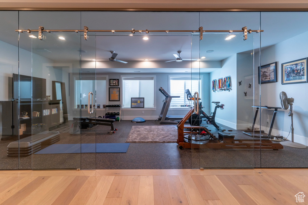 Workout area featuring ceiling fan