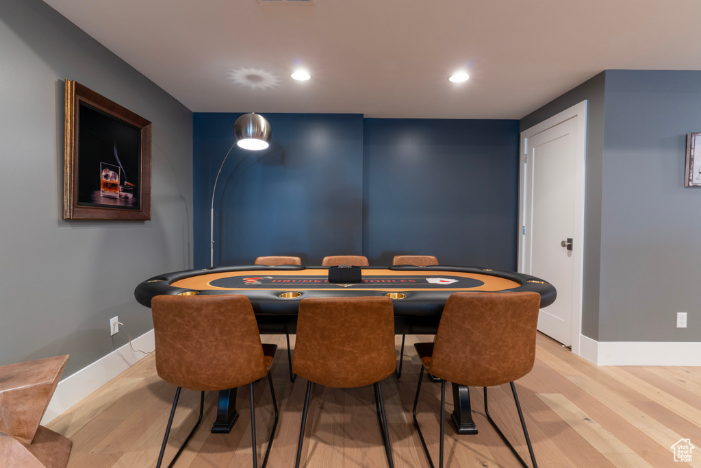 Dining room with light hardwood / wood-style floors