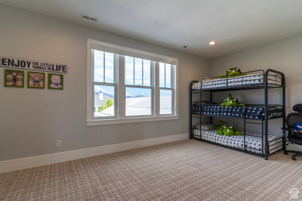 Bedroom with carpet flooring