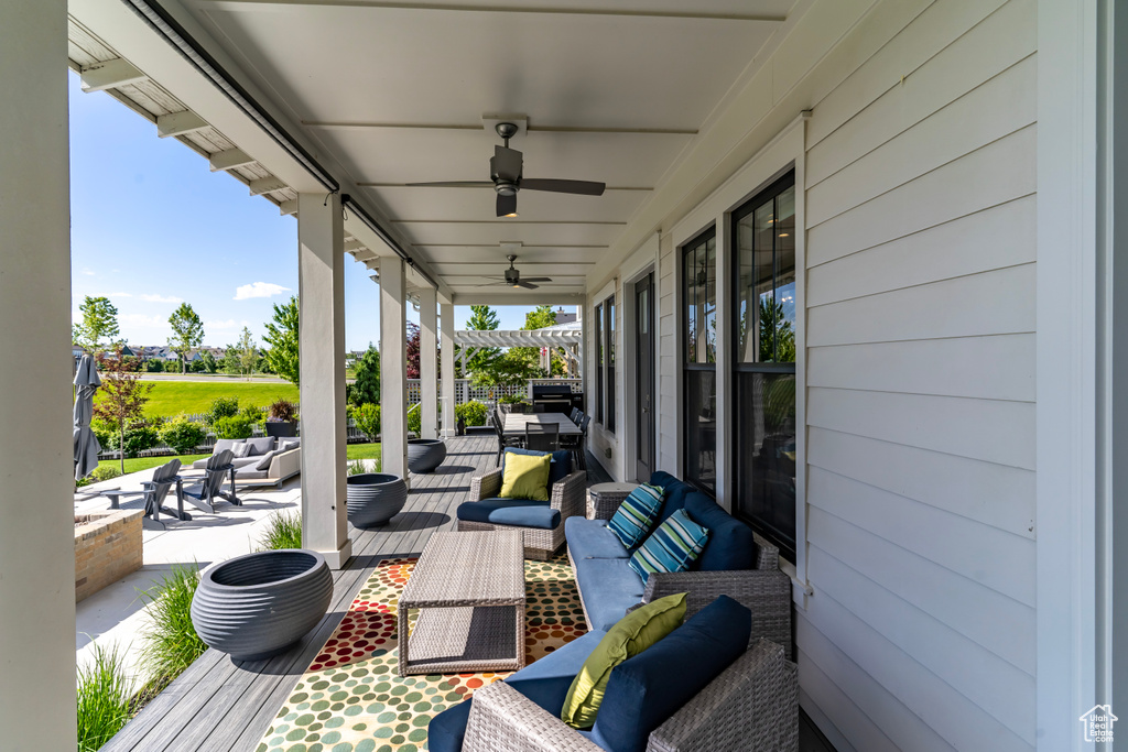 View of patio / terrace featuring outdoor lounge area and ceiling fan