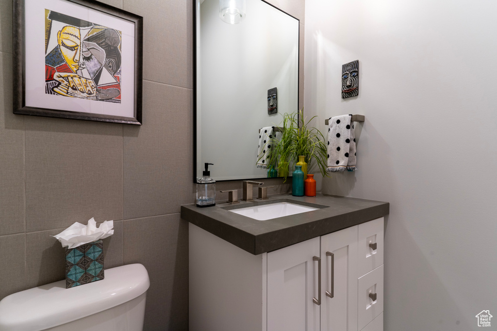 Bathroom with vanity and toilet