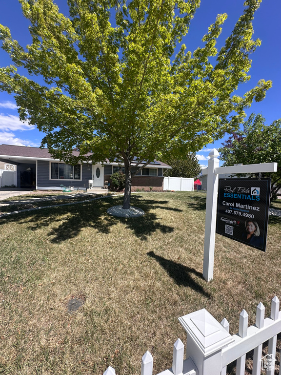 View of yard with fence