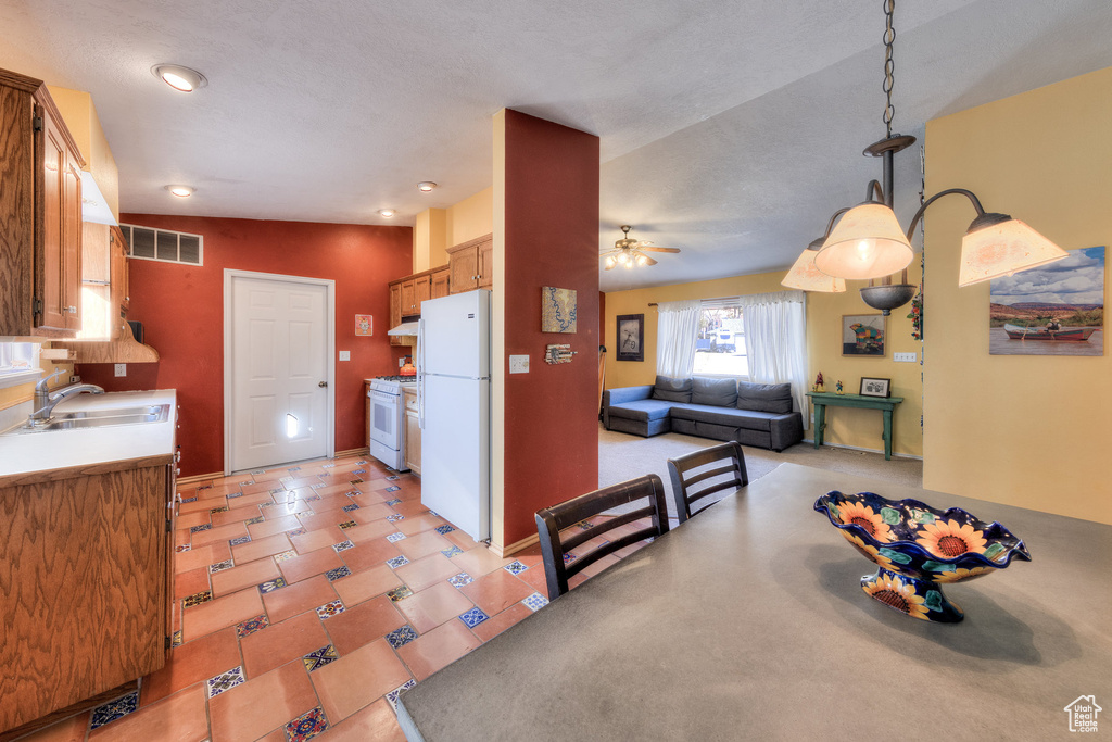 Dining room with a ceiling fan, recessed lighting, and baseboards