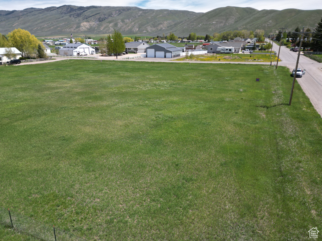 View of mountain background featuring nearby suburban area
