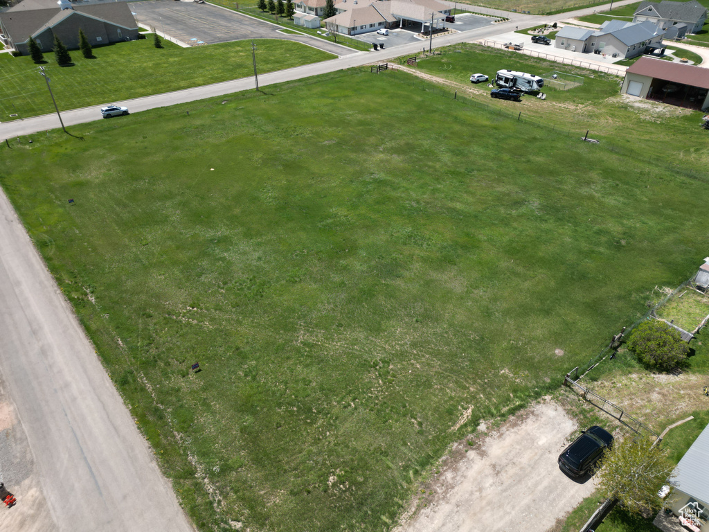Aerial view of property\'s location featuring nearby suburban area