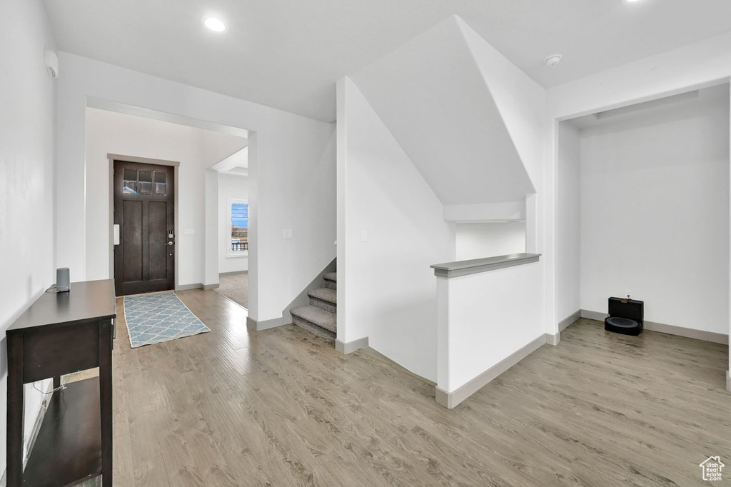 Entryway with light hardwood / wood-style floors