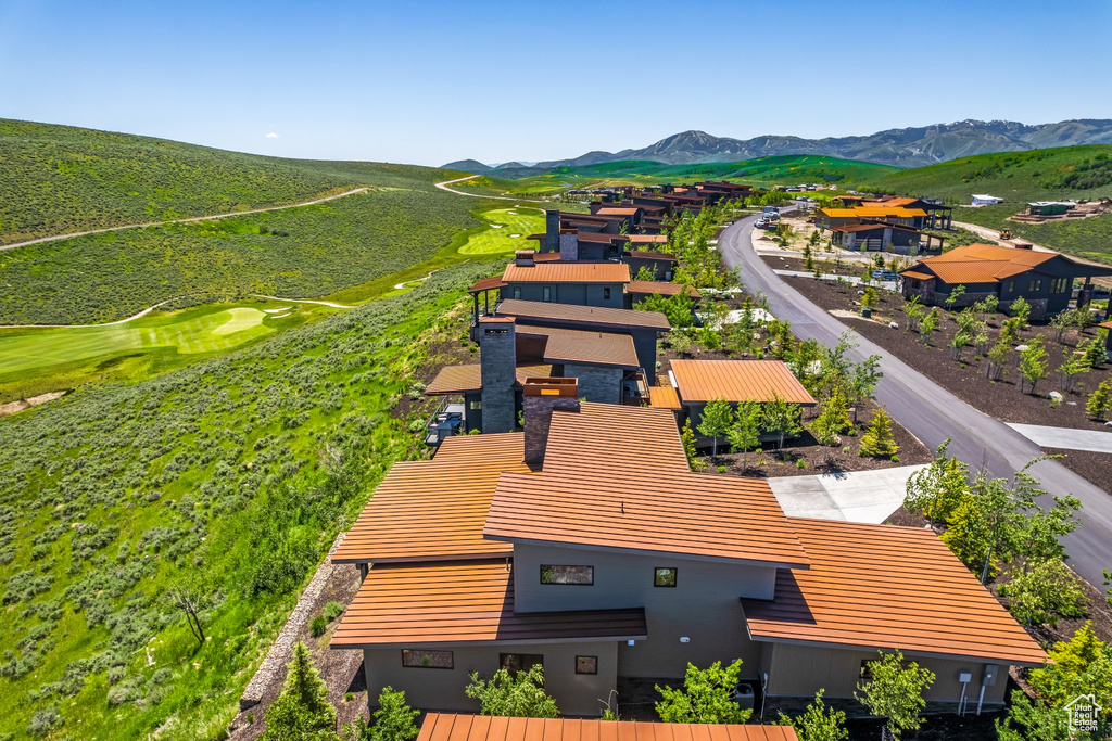 Aerial view featuring a mountain view and a residential view