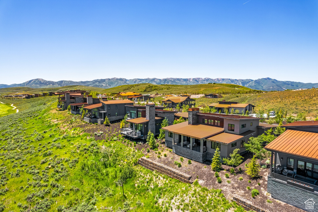 Birds eye view of property featuring a mountain view