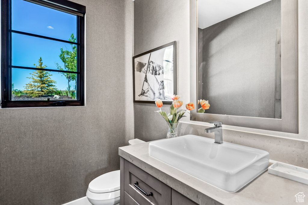 Half bath with toilet and vanity