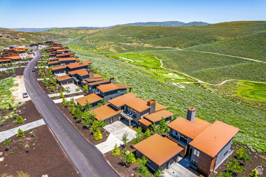 Bird's eye view featuring a mountain view, golf course view, and a residential view