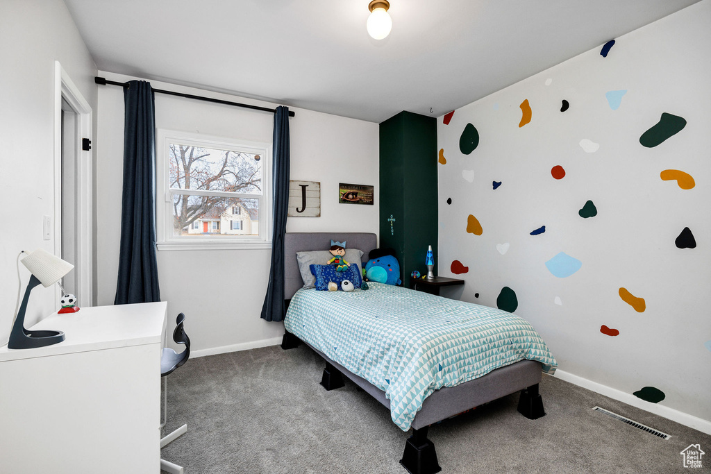 Bedroom featuring carpet
