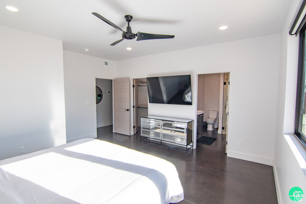 Bedroom with ensuite bathroom and ceiling fan