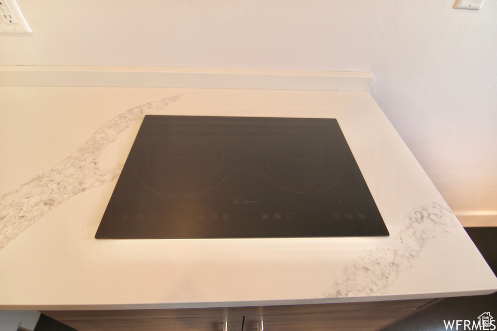 Details with black electric stovetop