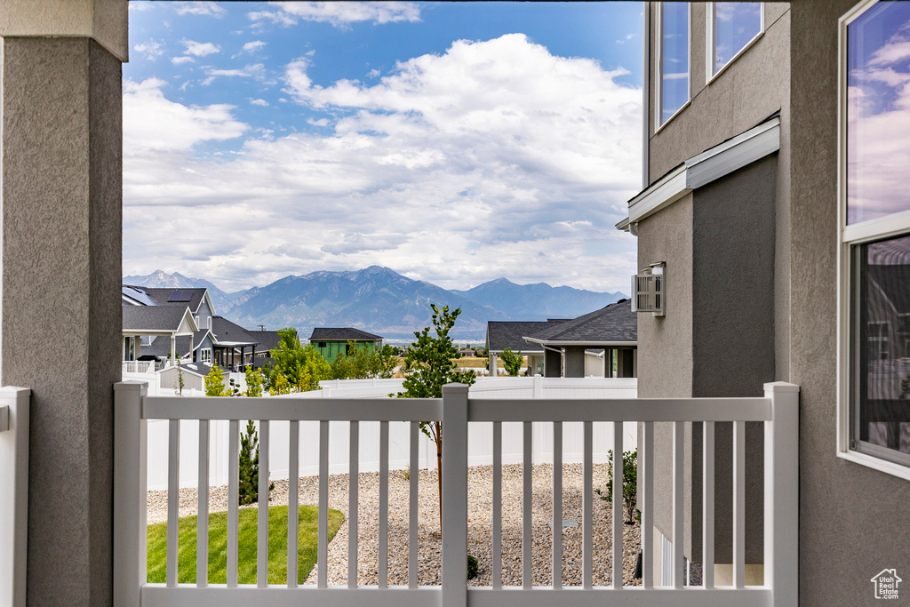 Balcony with a mountain view and a residential view