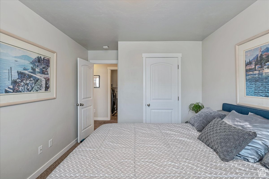 Bedroom with carpet flooring