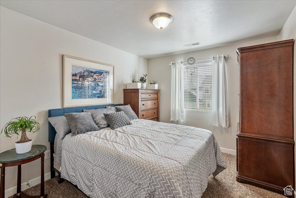 Bedroom featuring carpet