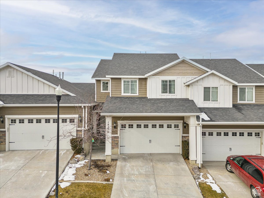 View of front of home with a garage