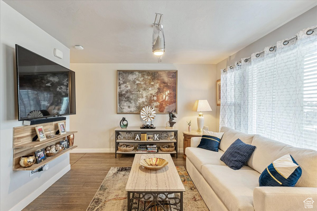 Living room with hardwood / wood-style floors