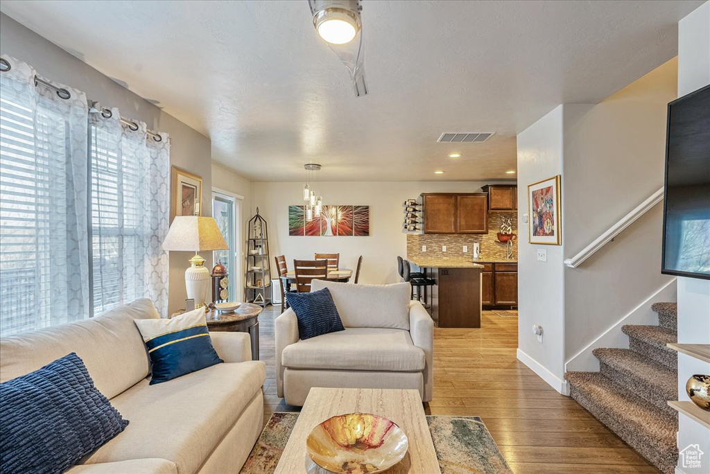 Living room featuring light wood-type flooring