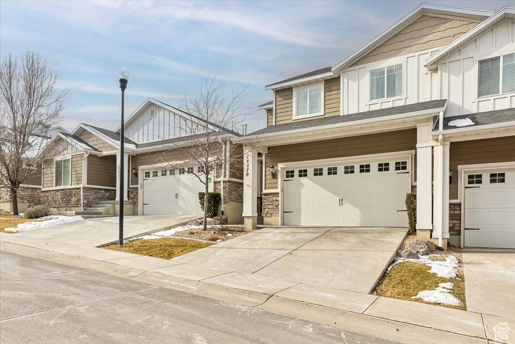 Craftsman-style home with a garage